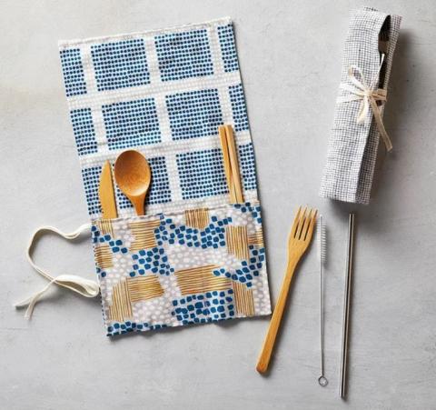 Photo of fabric utensil wrap with utensils in it