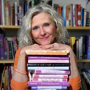 Author Coleen Paratore poses with some of her books