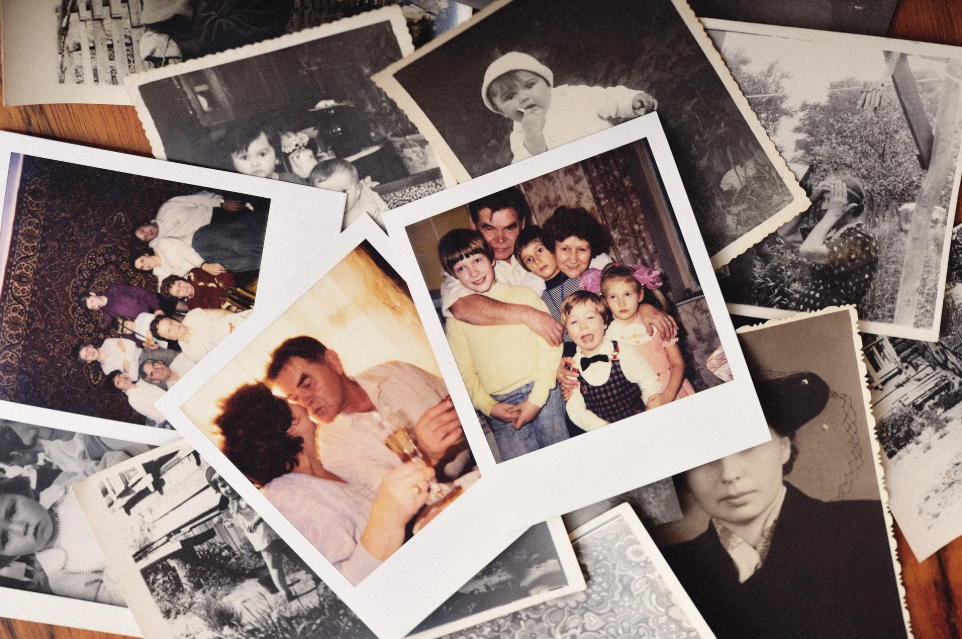 A messy stack of color photographs